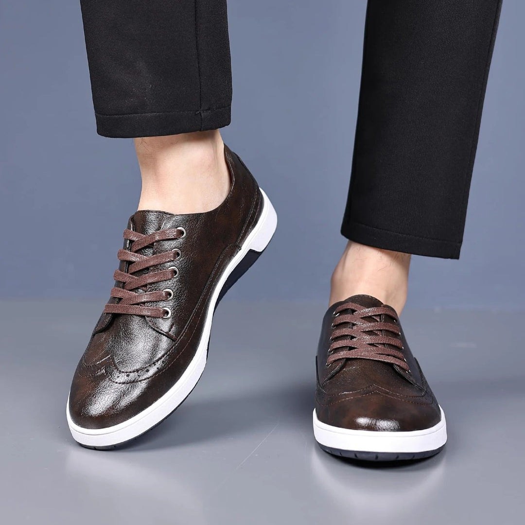 Versatile men's fashion hybrid brogue sneakers, ideal for dress or casual outfits.