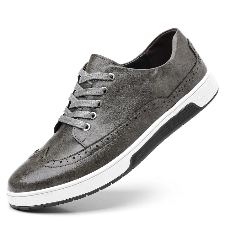 Men's dress casual hybrid brogue sneakers, offering sophisticated yet comfortable footwear.