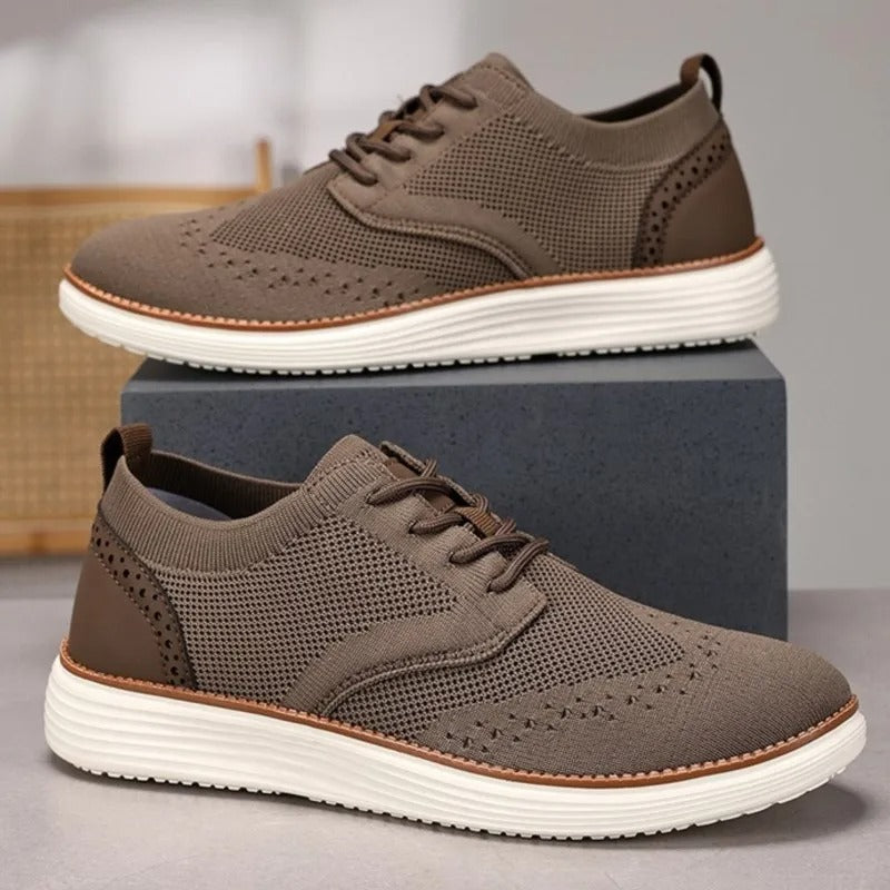 Modern men's hybrid shoes, formal casual lace-up wingtip design.