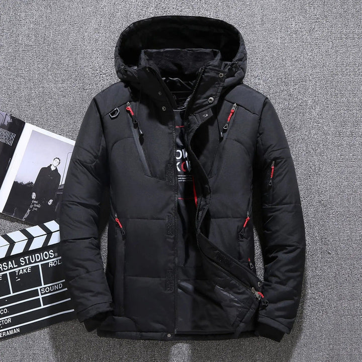Men's insulated hooded parka in dark color, ideal for extreme winter cold weather.