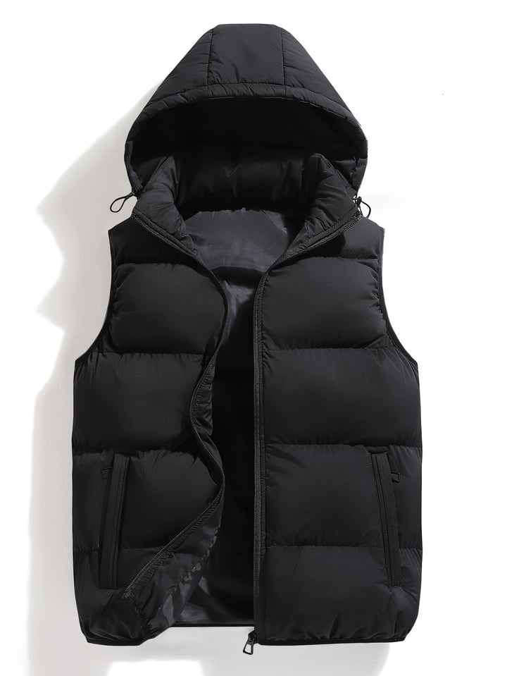 Stylish men's puffer vest, hooded and insulated, offering warmth and weather resistance for any outfit.