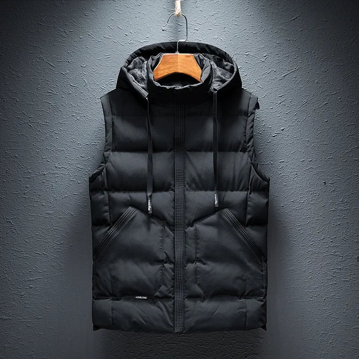 Sleek men's insulated hooded vest, designed for a comfortable fit and ultimate warmth in cold weather.