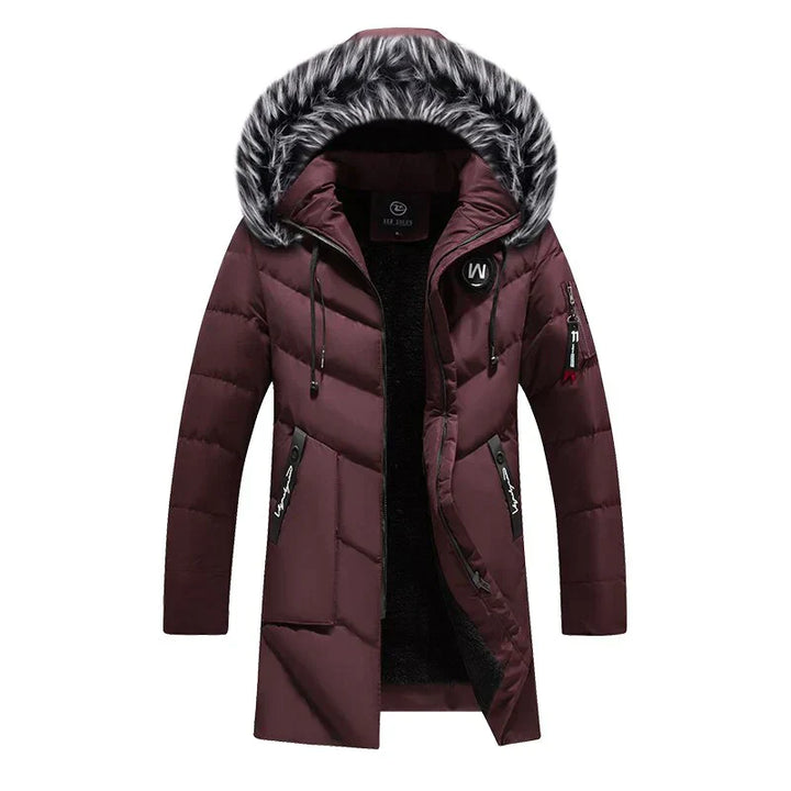 Men's ergonomic insulated parka, hooded, offering warmth and flexibility for active winter adventures.