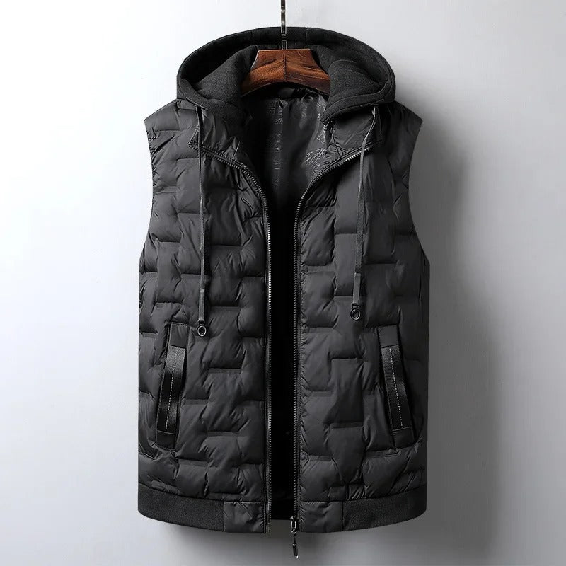 Warm men's winter vest with insulation and practical detachable hood. Ideal for hiking & travel.