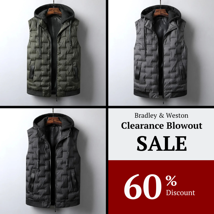 Close-up of the insulated men's travel vest fabric. Shows the high-quality material & detachable hood detail.