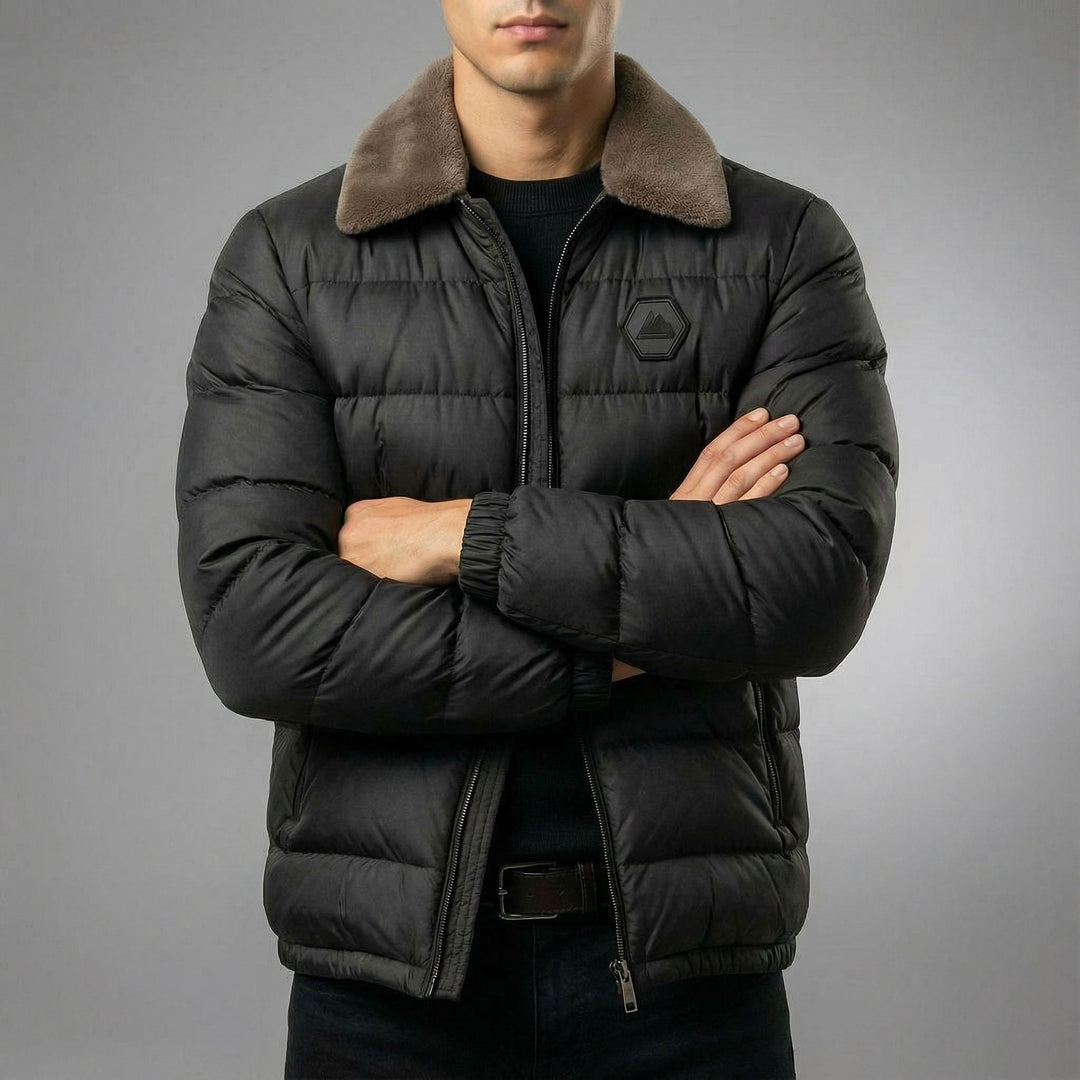 Heavy-duty men's insulated puffer jacket providing warmth and protection in extreme cold winter conditions. Outdoor ready.
