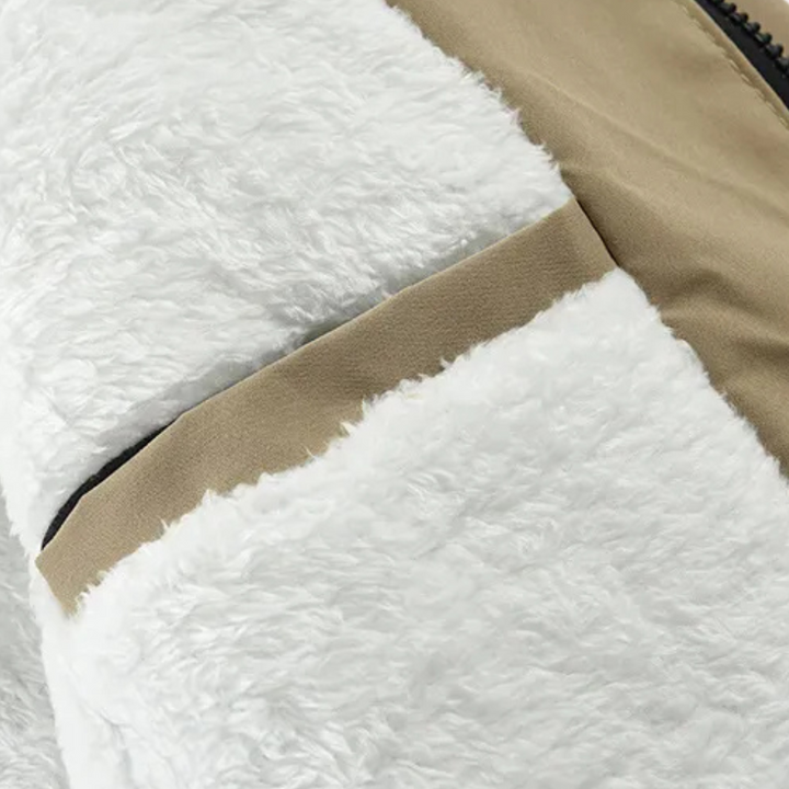 Heavy-duty insulated men's coat, offering superior warmth and durability in winter.