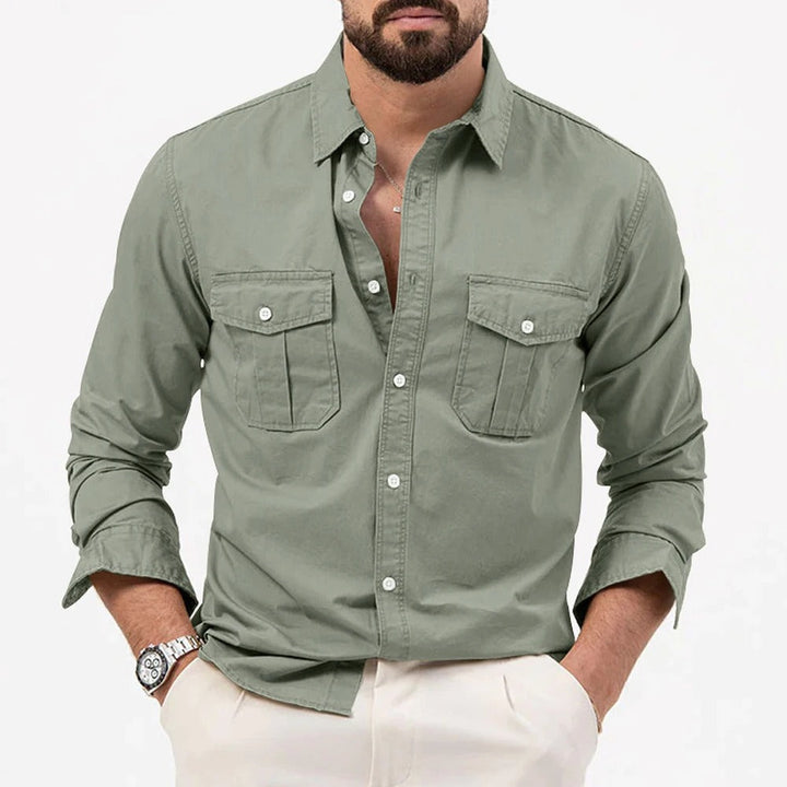 Men's tailored fit long-sleeve shirt with practical chest pockets, ideal for smart casual & professional men's clothing.