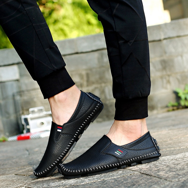 Man wearing elegant Italian-style slip-on loafers, perfect men's fashion for a refined casual look.