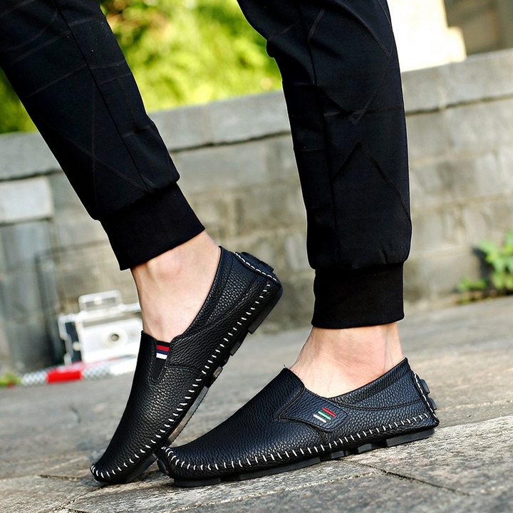 Man wearing elegant Italian-style slip-on loafers, perfect men's fashion for a refined casual look.