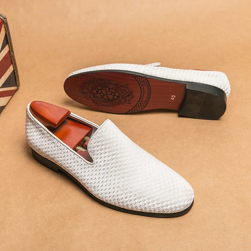 Men's smart casual loafers, slip-on style with a refined woven front, offering comfort and timeless appeal.