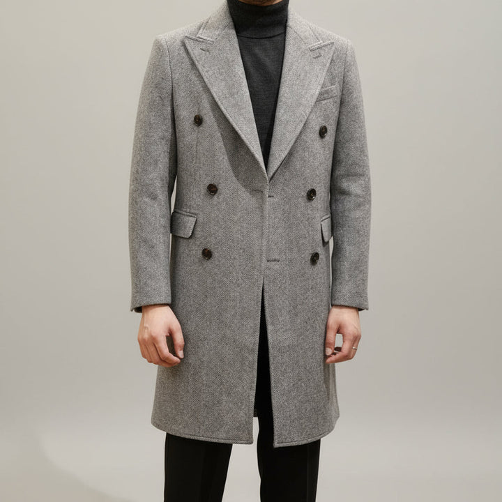 Classic men's double-breasted grey overcoat, Italian-style tailoring for sophisticated winter business outerwear.