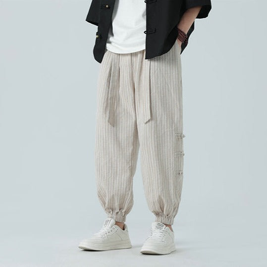 Japanese style men's comfort pants. Streetwear loose fit, side stripe design, perfect for casual urban wear.