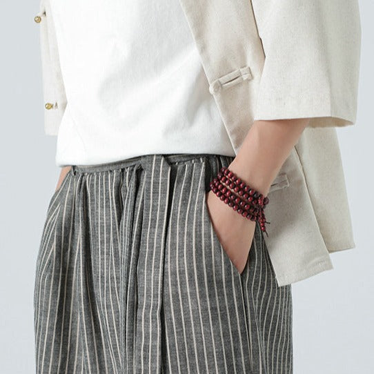 Comfortable men's streetwear pants. Loose fit, stylish side stripe, Japanese urban fashion for everyday wear.