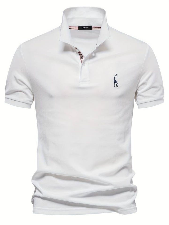 Man wearing a refined Jasper polo shirt, ideal for stylish everyday casual outfits & summer comfort.