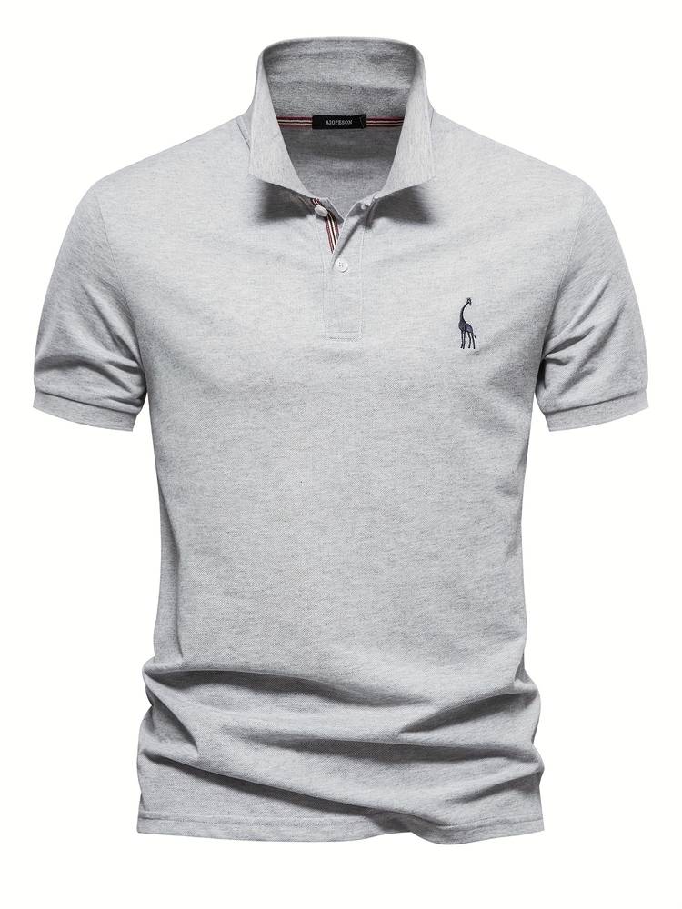 Close-up of a stylish men's Jasper polo shirt, highlighting refined texture & comfort for casual wear.