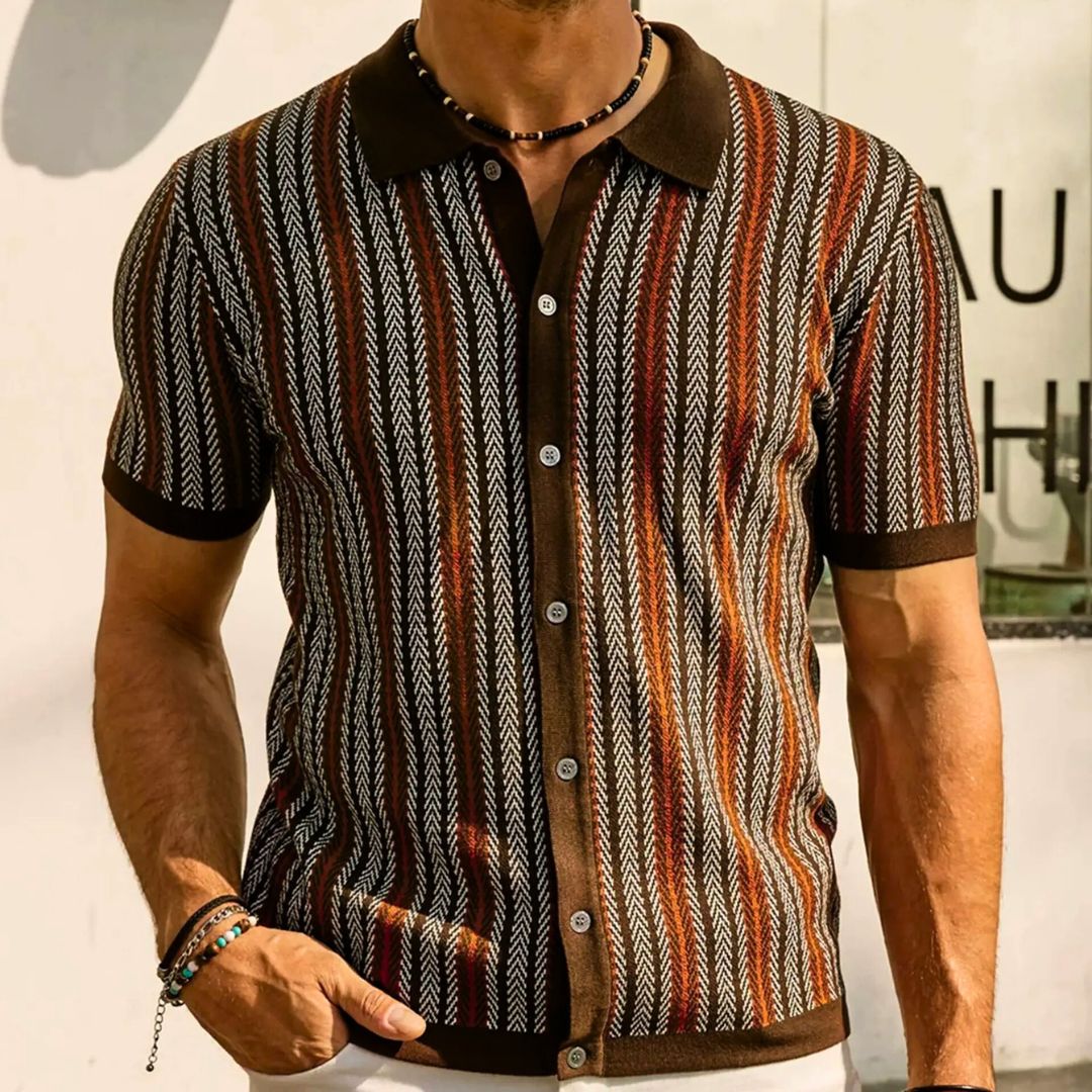 Breathable men's chevron polo shirt with button placket, short sleeve, offering everyday comfort & sporty style.