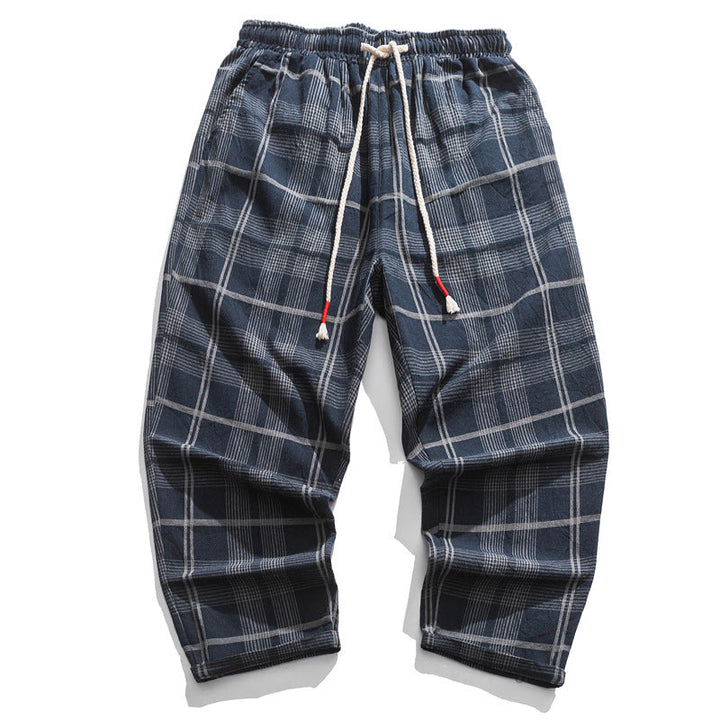 Men's Kaizen Grid pattern tapered ankle pants with drawstring, offering a comfortable, relaxed fit for casual style.