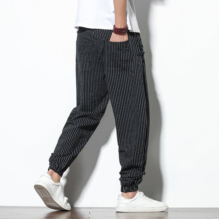 Kaizen men's apparel: striped joggers featuring a flexible drawstring waist.