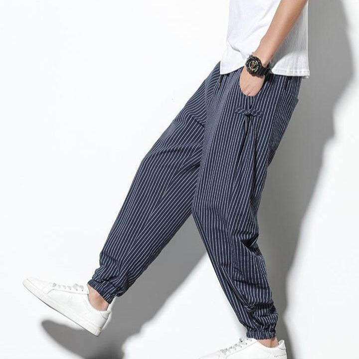 Relaxed fit men's striped pants, Kaizen joggers, versatile for active or lounge.