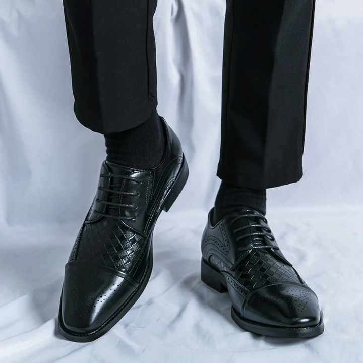 Men's fashion brogue shoes, an essential piece of formal footwear for sophisticated and timeless business attire.