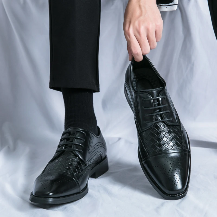 Full length shot of men's brogue dress shoes, showcasing elegant style, comfort, and versatile formal appeal.