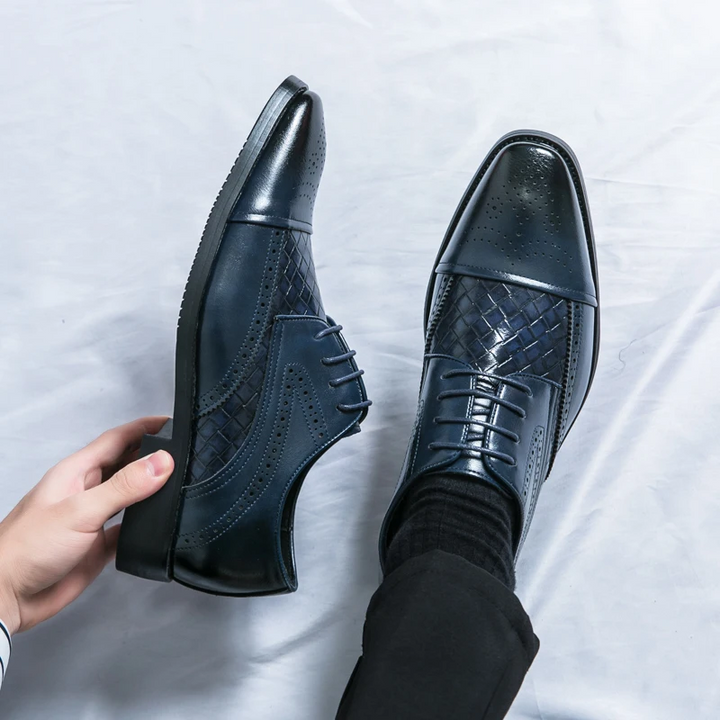 Men's Kensington brogue shoes with polished leather, showcasing classic style and high-quality craftsmanship.