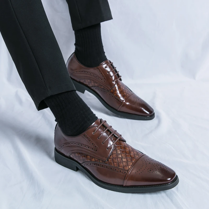 Front view of men's sophisticated brogue dress shoes, a timeless choice for business, formal, or elegant wear.