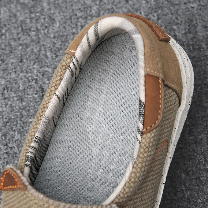 Versatile men's gray canvas slip-on flats, offering comfort & easy wear for daily activities.
