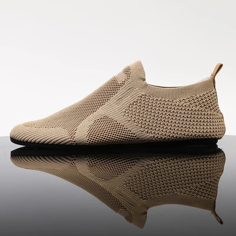 Men wearing khaki knit slip-on barefoot shoes. Comfortable, breathable, perfect for casual style.
