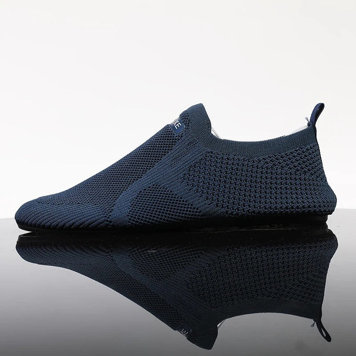 Easy wear men's khaki knit slip-on shoes. Laceless, lightweight, and breathable barefoot comfort.