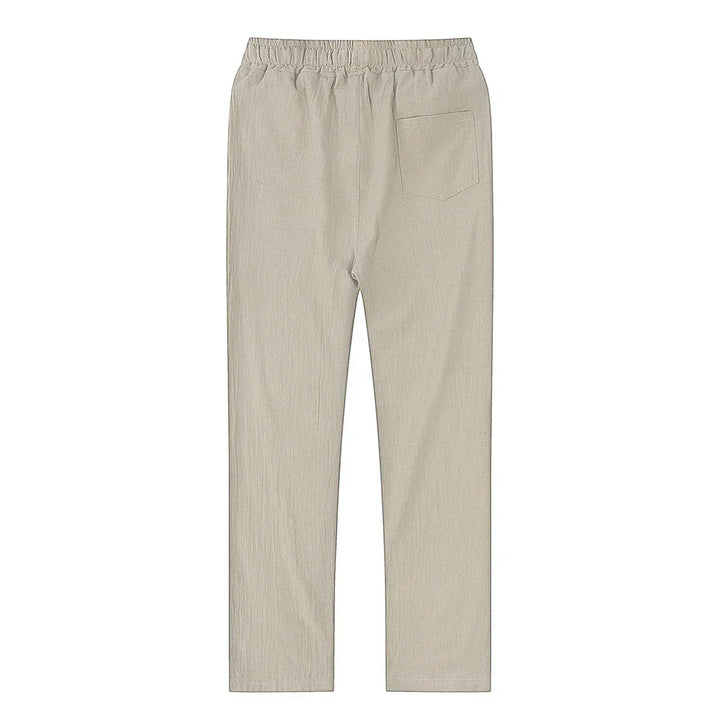 Relaxed fit men's khaki linen cotton blend trousers, ideal for breathable summer comfort.