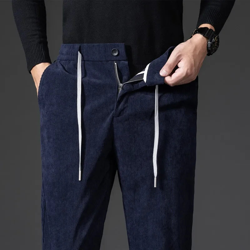 Dark gray men's relaxed fit drawstring pants, combining comfort with versatile casual style.