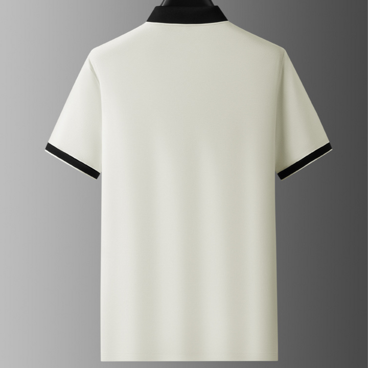 Stylish men's casual polo with a unique contrast collar. Soft knit fabric for ultimate comfort and versatility.