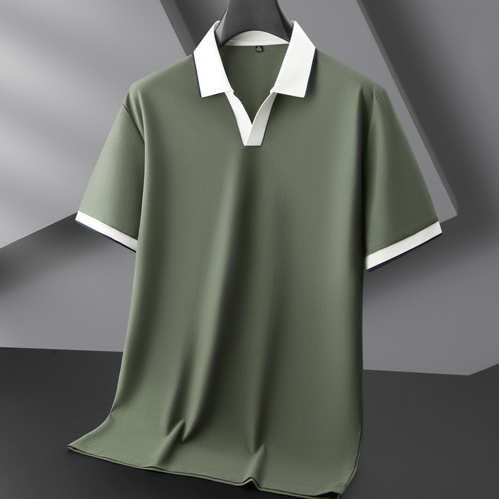Fashionable men's polo shirt, soft knit material, contrast collar, suitable for everyday wear and smart casual outfits.