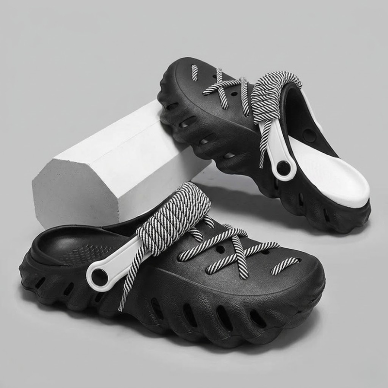 Secure-fit men's clogs, laced, ensuring lightweight comfort and breathability.