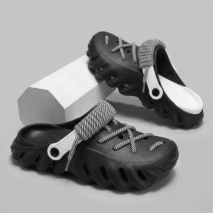 Secure-fit men's clogs, laced, ensuring lightweight comfort and breathability.