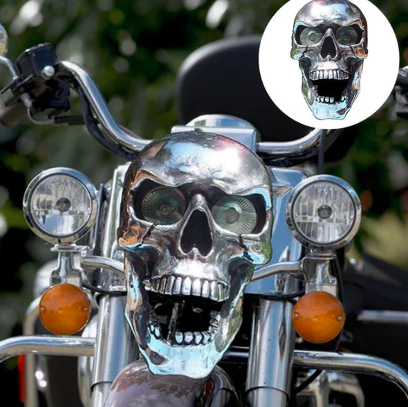 Men's LED motorcycle headlight with a unique skull design, perfect for custom choppers and cruisers.
