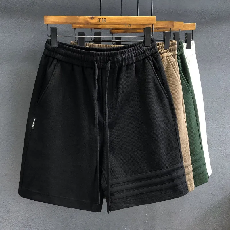Relaxed fit men's striped comfort shorts in black. Heavyweight fabric makes them perfect for casual or athletic wear.