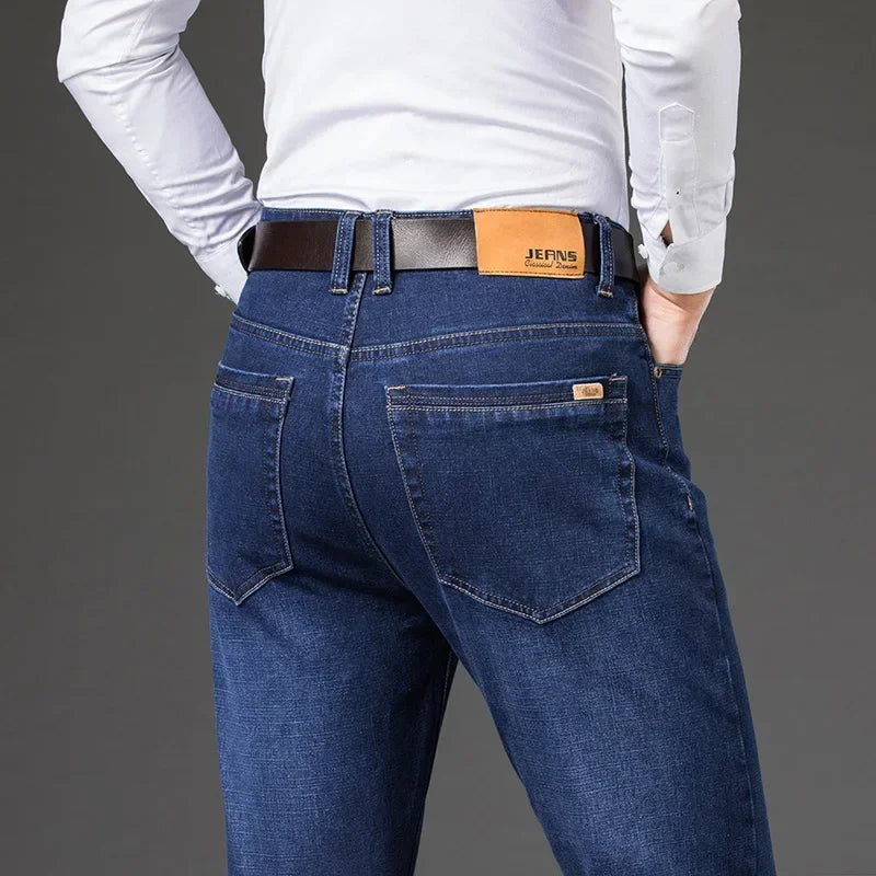 Men's Legacy straight leg stretch denim jeans in classic blue wash, comfortable for everyday wear.