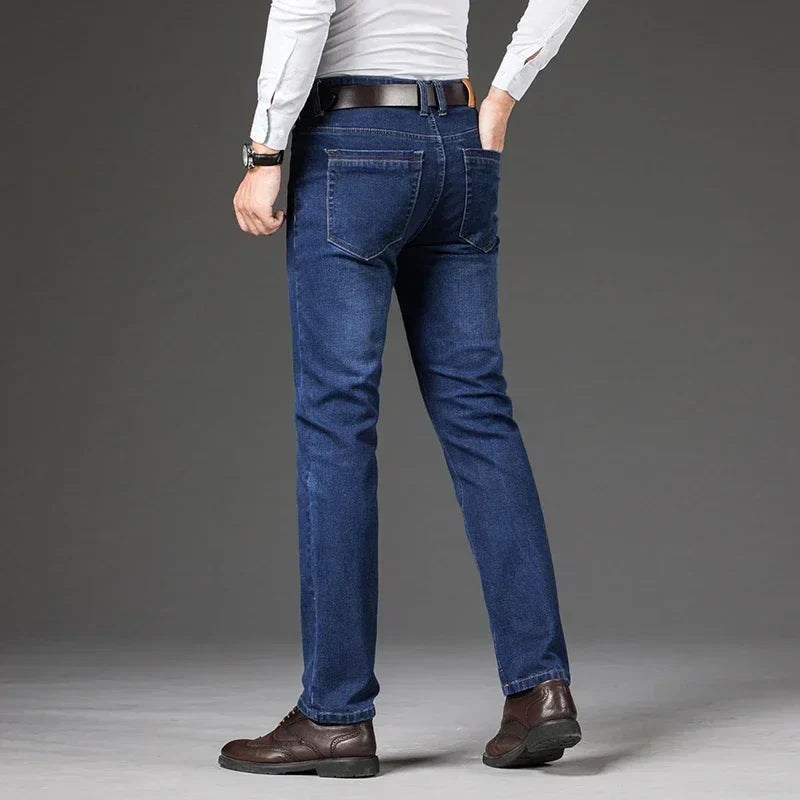 Sleek men's black Legacy straight leg stretch denim jeans, versatile casual pants for modern fashion.