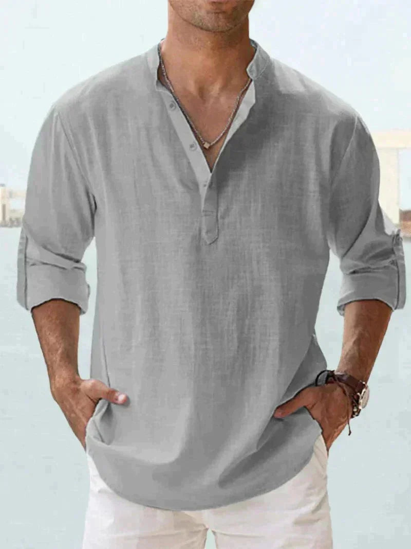 Model wearing a men's black linen blend summer shirt, short sleeve, demonstrating a relaxed fit