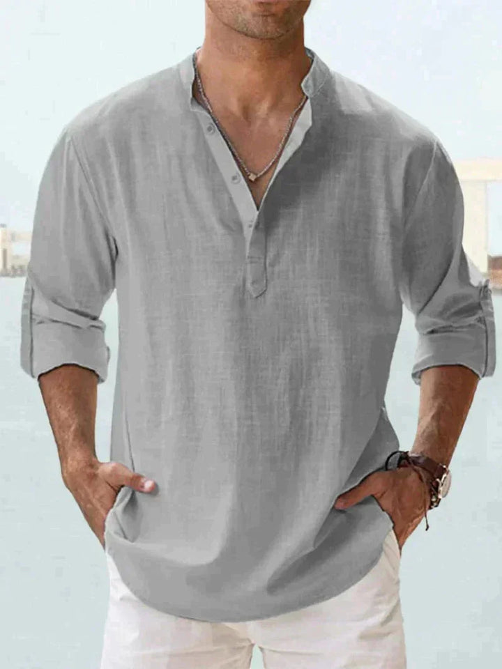 Model wearing a men's black linen blend summer shirt, short sleeve, demonstrating a relaxed fit