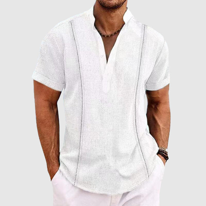 Stylish men's white short sleeve top, offering casual comfort. Ideal versatile apparel for summer outfits.
