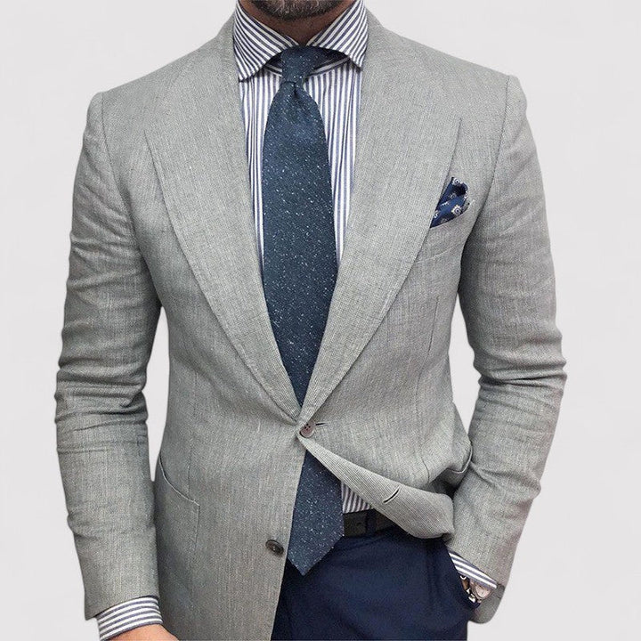 Men's light gray slim fit blazer, perfect for smart-casual events & business attire. Tailored jacket.