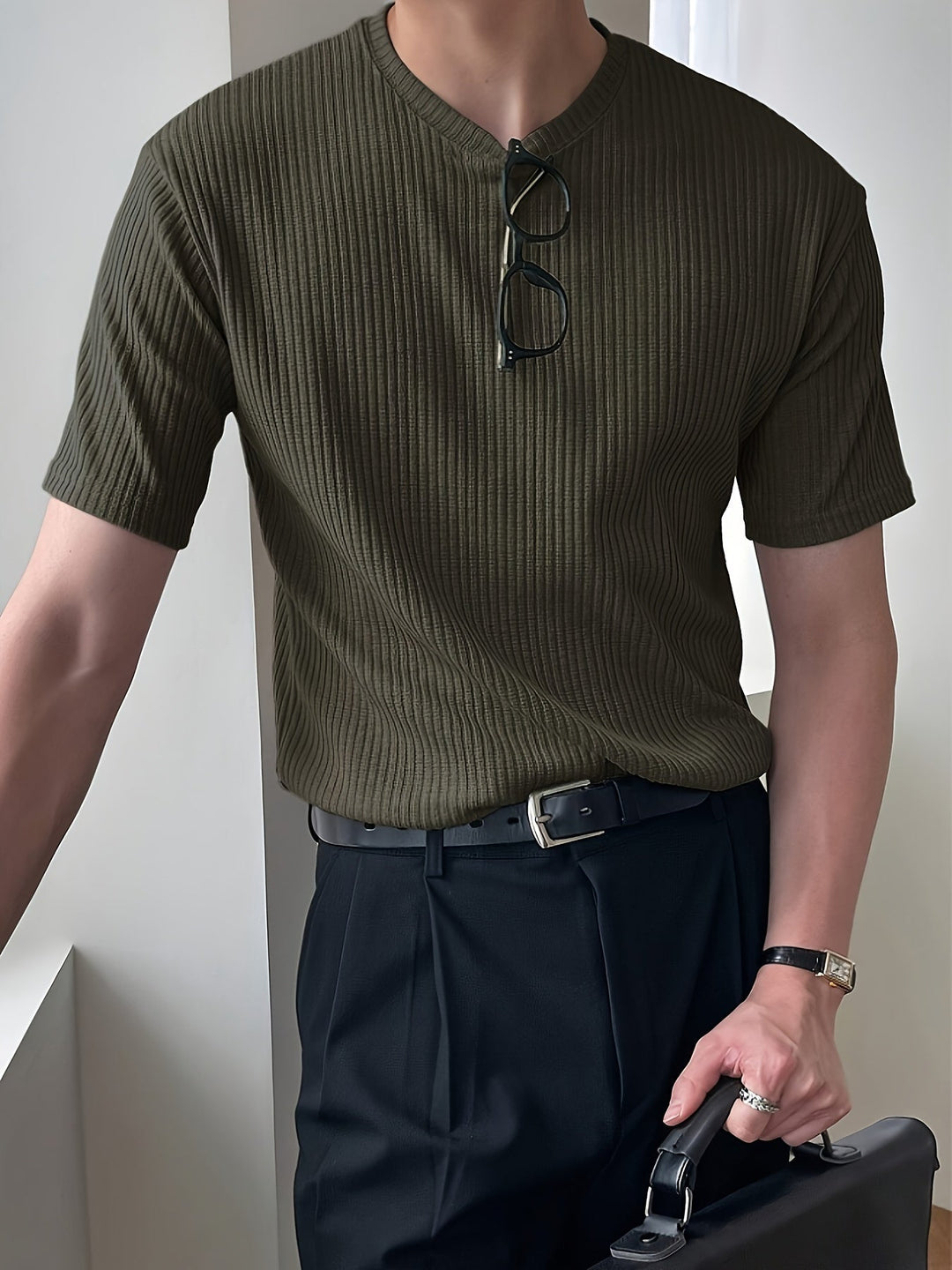 Modern men's light green lightweight t-shirt, a comfortable summer top for casual everyday style.