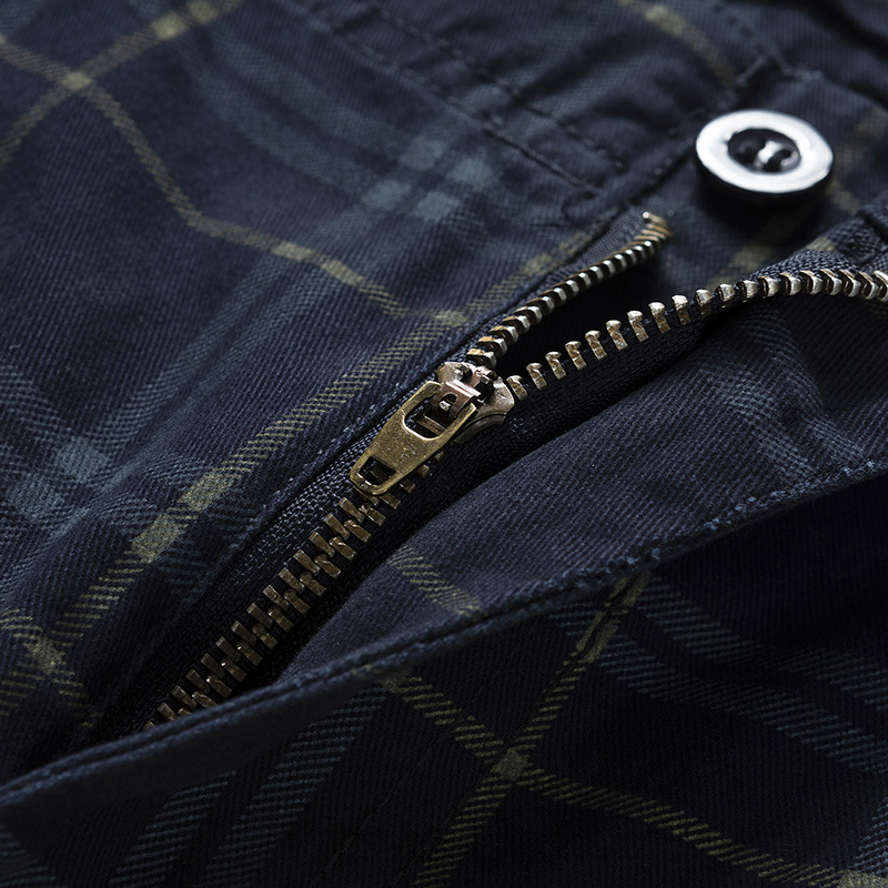 Back view of men's lightweight adventure cargo shorts with check pattern, showing rear pockets & fit.
