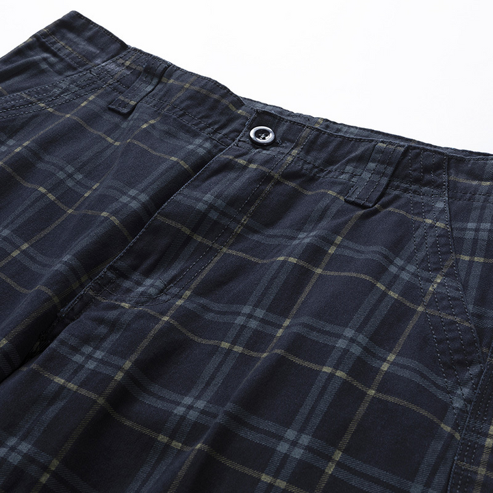 Outdoor men's lightweight adventure shorts in a classic check pattern, offering ultimate comfort and style.