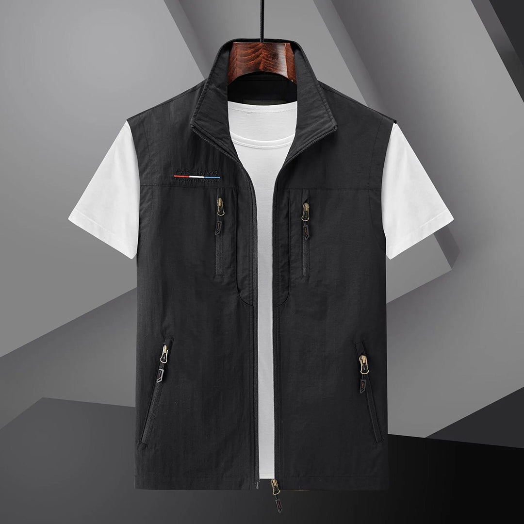 Men's multi-pocket utility vest with zip closures for outdoor adventures, fishing, and travel.