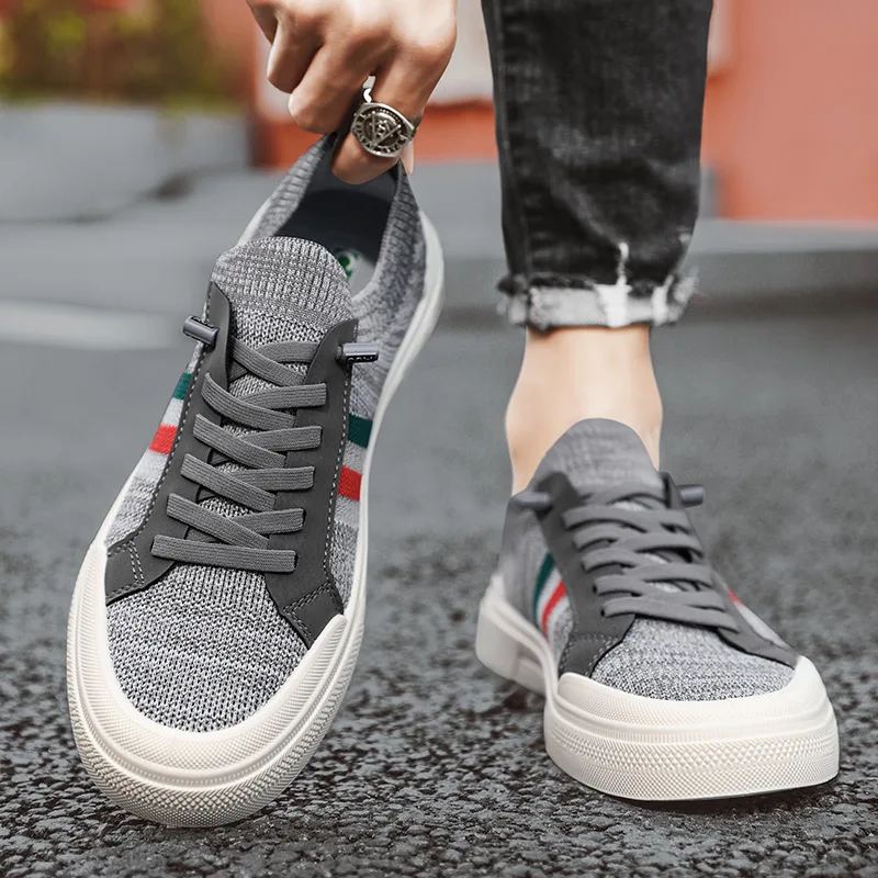 Sleek black men's lightweight athletic sneakers, cushioned for versatile casual wear & active daily comfort.